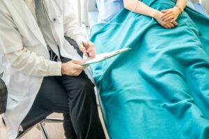 doctor-check-up-discuss-with-patient-clinic-doctor-talk-with-women-patient-hospital (1)