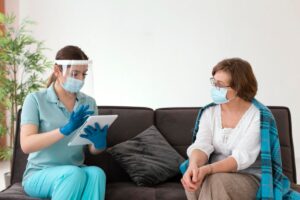 medium-shot-woman-checking-patient (1)