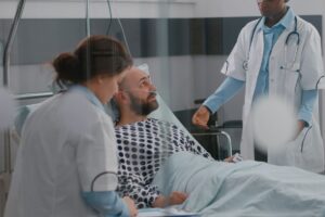 patient-discussing-with-doctors-while-lying-bed-sickness-recovery (1)